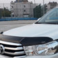 Kuvassa Tuuliohjain konepeltiin Toyota Hilux 2020-